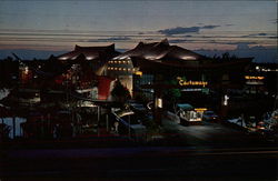 Castaways Motel at Night Postcard