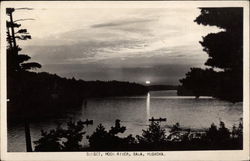 Sunset over Moon River Postcard