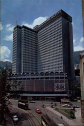 Hong Kong Hilton Hotel and Des Voeux Road Postcard