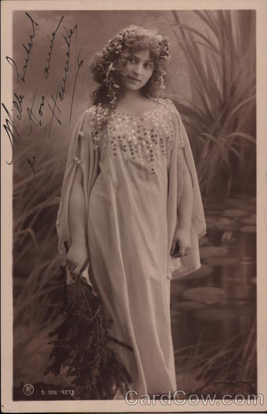 Woman With Curly Hair in Long Gown Women