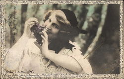 Woman Eating Grapes Postcard