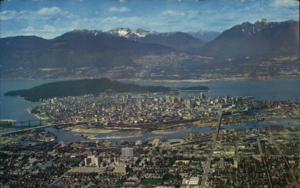 Aerial View of Downtown, Harbour & Mountains Vancouver BC Canada