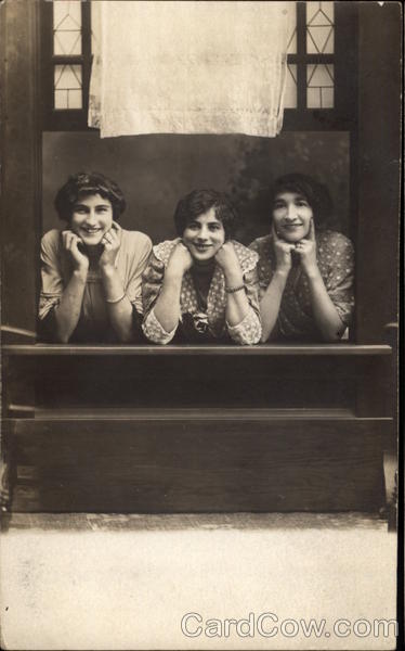 Three Women in Window