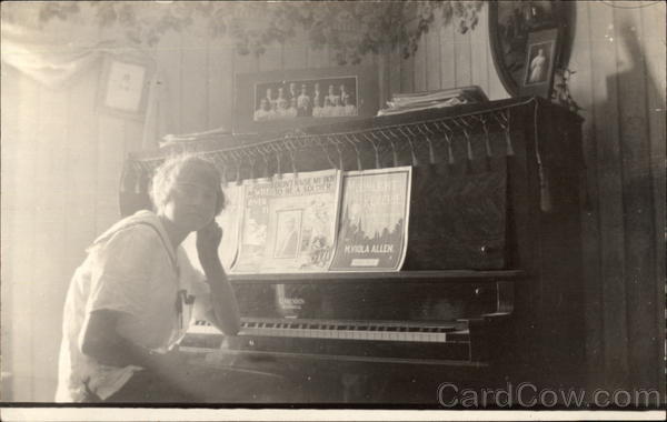 Girl Posing at Piano Pianos