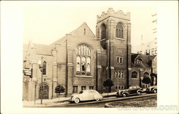 Cars Parked In Front of Church Buildings