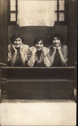 Three Women in Window Postcard