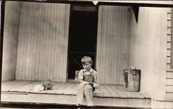 Young Boy on Porch Postcard