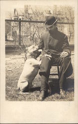 Man in Hat with Pit Bull Postcard