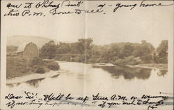 View up River to Bridge Postcard