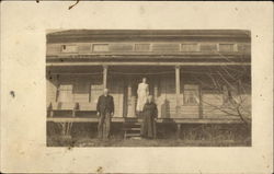 Family on Home's Porch Postcard