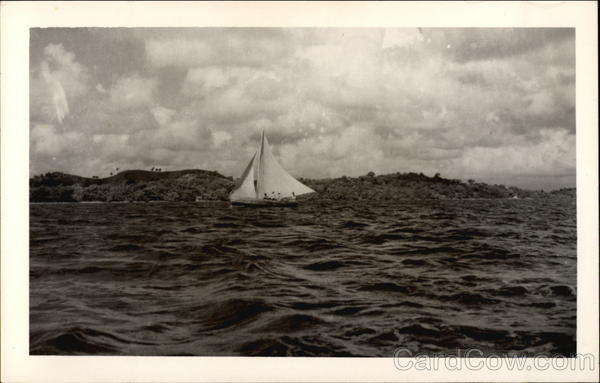 Sailboat along coast Les Cages Haiti Caribbean Islands
