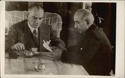 Two Men at Table Postcard