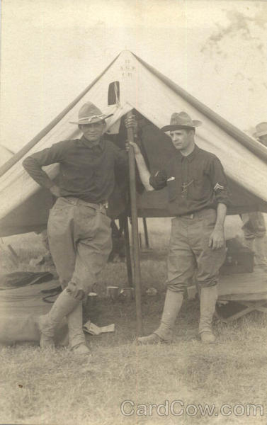 Uniformed men with tent