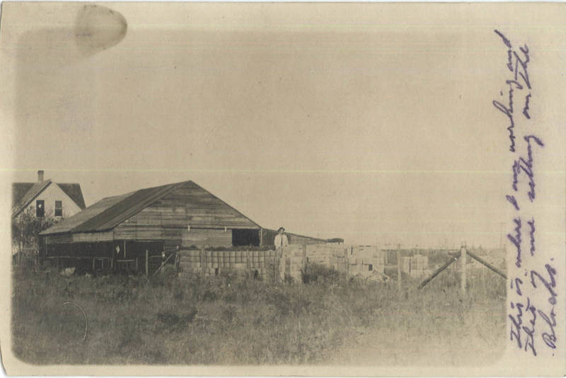 Man with Crates, on Farm Hecla South Dakota