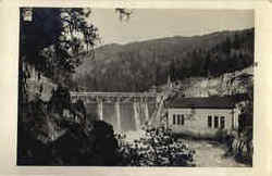 Water spilling over dam Postcard
