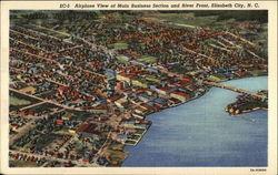 Airplane View of Main Business Section and River Front Postcard