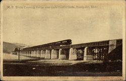 N.P. Train Crossing Bridge over Lake Pend O'Reille Postcard