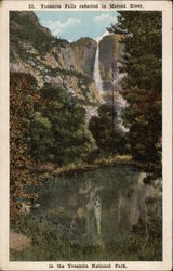 Yosemite Falls reflected in Merced River, in the Yosemite National Park Yosemite Falls reflected in Merced River, in the Yosemite National Park