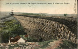 One of the water flumes of the Oakdate Irrigation Co., about 12 miles from Oakdale Postcard