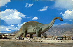 Dinosaur Replica Towers Over Visitors to The Dinosaur Gardens Cabazon, CA Postcard Postcard