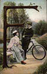 Letter "F" with a Woman, Man, and Bicycle Postcard