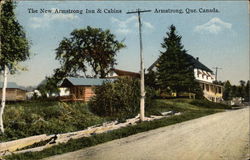 The New Armstrong Inn & Cabins Postcard