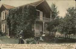 Family in Front of Home Postcard