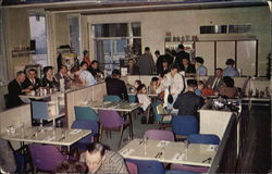 Greetings from the Voyageur Restaurants & Esso Service Centre Postcard