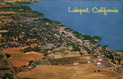 Aerial View of Town and Shoreline Postcard