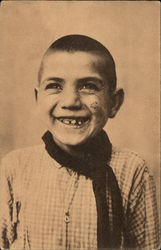 Boy in checked shirt with toothy smile Postcard