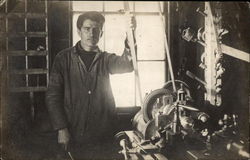 Man at Machine Postcard