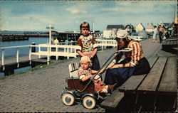 Family on Boardwalk Postcard