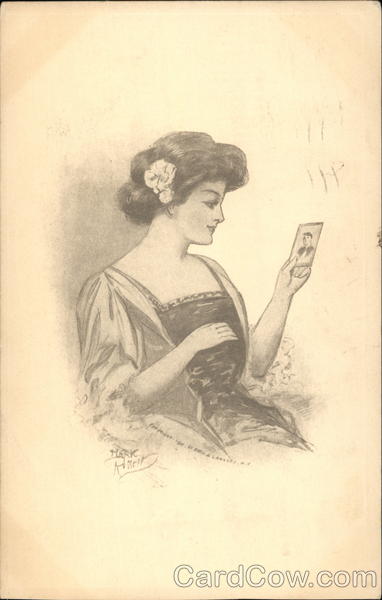 Woman Looking at a Photograph Romance & Love