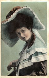 Dark Haired Woman Wearing Large Brown and Cream Hat Postcard