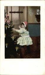 Young GIrl and Christmas Tree Postcard