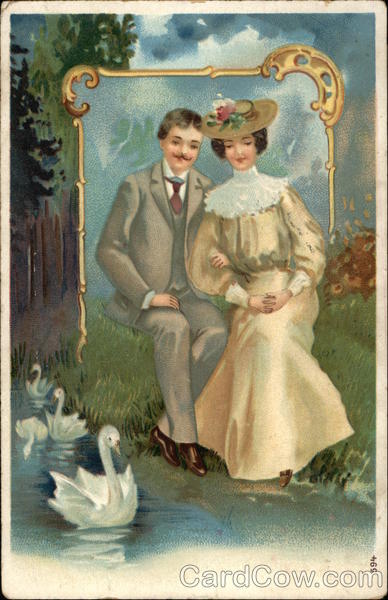 Couple Sitting Beside Pond Watching Swans Couples