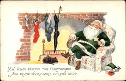 Santa in Green Suit Rests By Fireplace, With Stockings and Cat Postcard