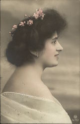 Woman in White Dress With Flowers in Hair Postcard