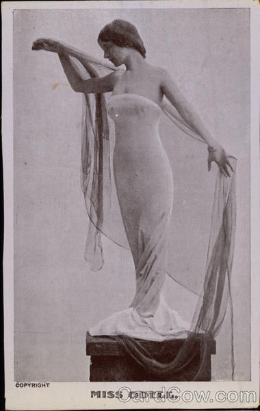 Miss Odell standing on a Pedestal Women