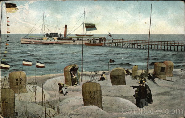 Paddle Steamer Docked at Pier on Shoreline Steamers