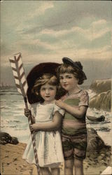 Children holding Oar on the Shoreline Postcard