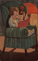 Boy & Girl Reading a Book in a Large Chair Postcard