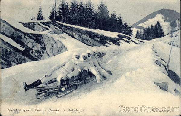 Bobsled Course with Six Men in the Snow