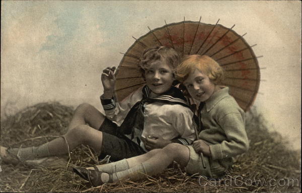 Merry and Bright - Children Sitting under Umbrella