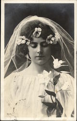 A Bride Wearing Veil with White Flowers A Bride Wearing Veil with White Flowers