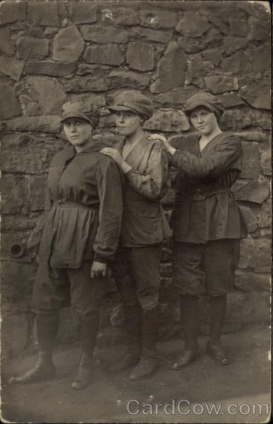 Three Young Women Dressed as Boys