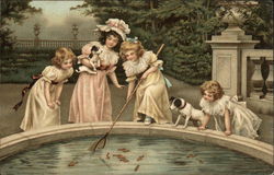 Four Little Gilrs with Puppies at the Fish Pond Postcard