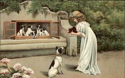 Young Girl Taking Photographs of Black & White Puppies Postcard