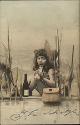 Young Girl Eating by the Water with Fishing Basket Postcard