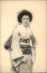Photograph of Geisha Girl Holding Large Knife Photograph of Geisha Girl Holding Large Knife